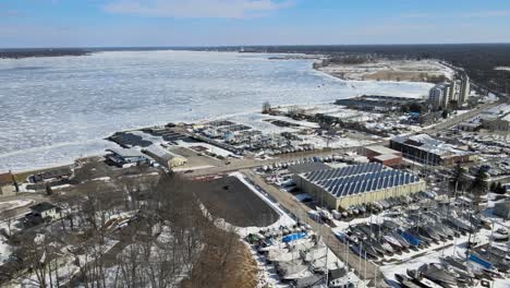Aerial-push-over-the-various-docks-and-marinas-on-Muskegon-Lake