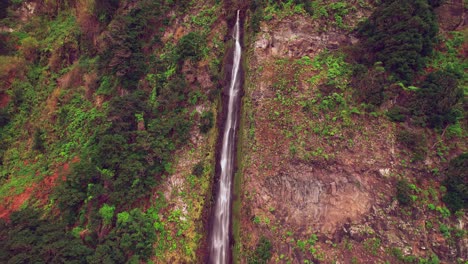 Getting-closer-to-an-isolated-waterfall-on-a-mountain