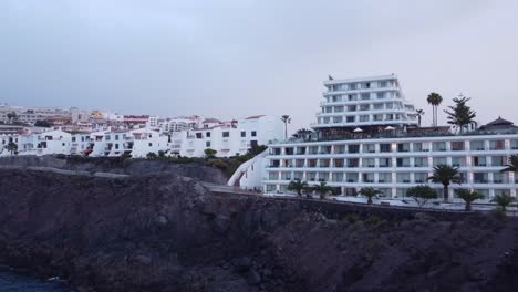 Tenerife-Costa-Adeje-aerial-footage-of-hotels-during-sunset-beautiful-stunning-location-for-travel-holidays-vacation
