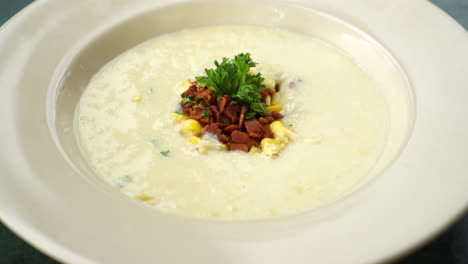 corn-soup-with-crispy-bacon-on-plate
