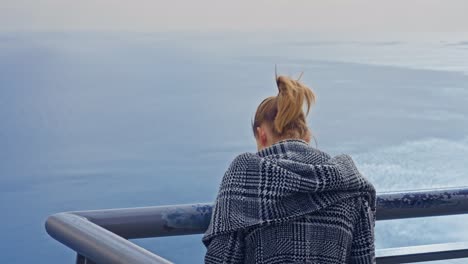 Woman-looking-at-the-view-on-the-edge