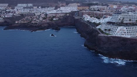 Costa-Adeje-Tenerife-Spain-beautiful-resorts-aerial-footage-at-coastline-during-sunset-magic-hour