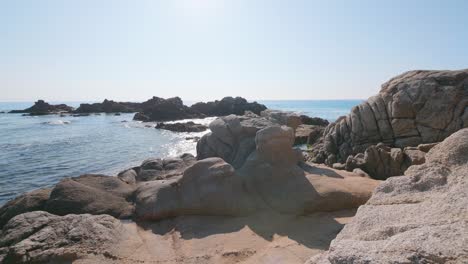 Rock-formations-at-the-beach-in-Santa-Cristina,-Lloret-de-Mar,-Costa-brava,-Spain