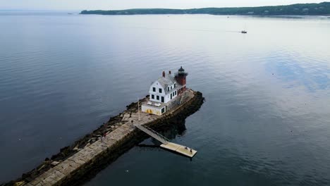 Rockland-Breakwater-Lighthouse-in-Penobscot-Bay,-Maine-|-Aerial-Circling-View-|-Summer-2021
