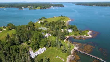 Scenic-Houses-and-Coastline-in-Penobscot-Bay,-Maine-|-Mid-day-Aerial-Panning-View-|-Summer-2021