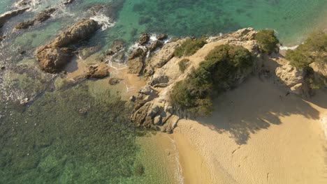 Beautiful-Santa-Cristina-rocky-shoreline-beach-in-Lloret-de-Mar,-Spain