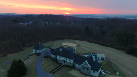Sprawling-mansion-estate-in-rural-gated-community-at-sunrise