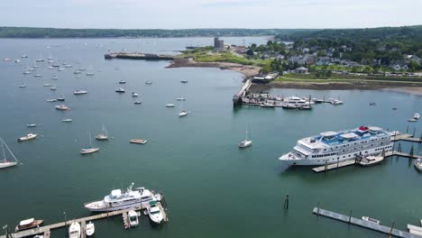 Boats-Docked-at-Rockland-Harbor-in-Maine-|-Aerial-View-Panning-Across-|-Summer-2021