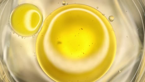 Yellow-Oil-Drops-Spliting-in-to-Smaller-Bubbles