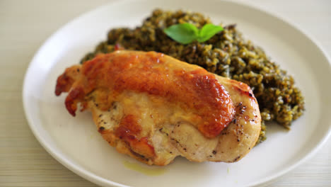 pesto-fried-rice-with-grilled-chicken-on-white-plate