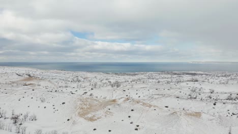 Drone-Reveals-Snow-Covered-Sand-Dunes-at-Sleeping-Bear-Dunes-National-Lakeshore
