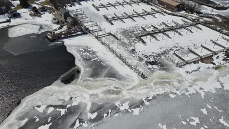 Various-marinas-on-a-frozen-lakeshore-in-late-winter