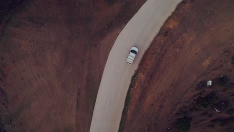 Aerial-view-following-a-car-on-the-country-side-road