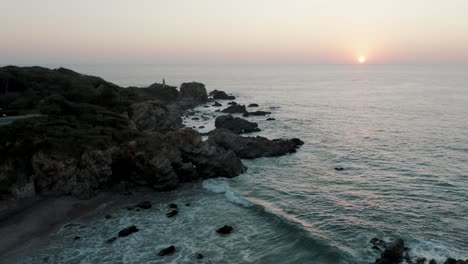 Scenic-Sunset-At-The-Beach-In-Puerto-Escondido,-Mexico---aerial-drone-shot