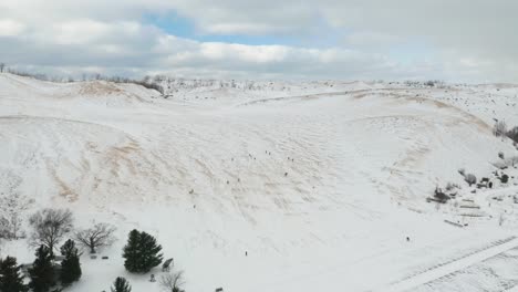Static-View-of-People-Sledding-at-Sleeping-Bear-Dunes-National-Park-in-Winter