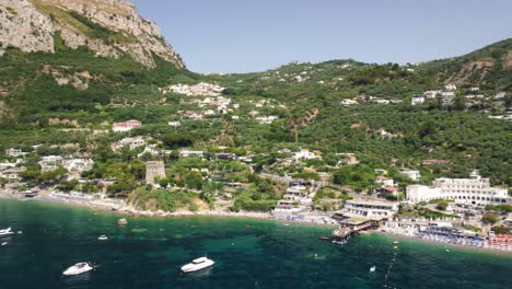 Aerial-view-from-right-to-left-of-Amalfi-Coast-in-Punta-Campanella-Natural-Park,Italy-with-beautiful-panoramic-view-of-the-coastline-on-summer-day