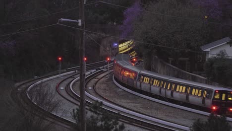 A-Train-Heads-Into-A-Tunnel-As-Night-Falls