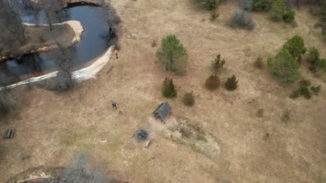 AERIAL:-Shed-nar-the-River-in-Dzukija-National-Park-in-Lithuania