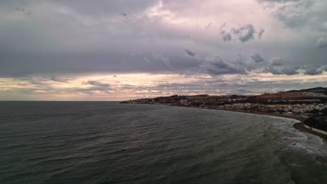 Aerial-panoramic-view-of-the-coastline-on-a-cloudy-day