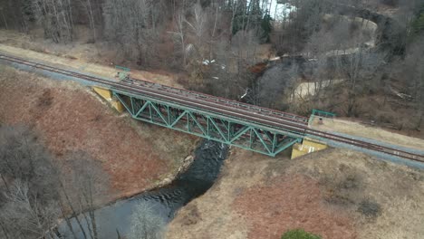 AERIAL:-Train-Tracks-on-the-Top-of-Bridge-Constructed-Above-Flowing-River