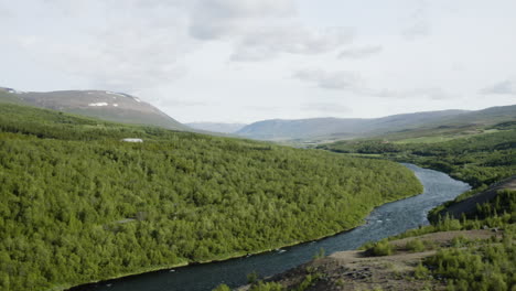 AERIAL---Fnjoska-river-and-hills,-Vaglaskogur-Forest,-Fnjoskadalur,-Iceland,-rising