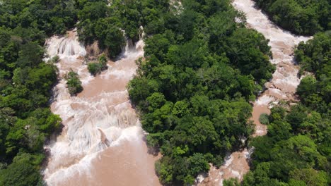 Agua-Azul-waterfalls-flooded-after-heavy-rainfall,-Mexico,-4K-aerial-view