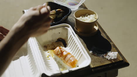 Trying-to-eat-shooing-away-flies-Sushi-entree-roll-rice-eel-sashimi-chopsticks-4K