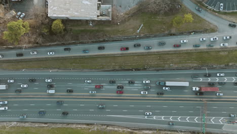 Slow-static-zoom-out-aerial-of-highway-traffic
