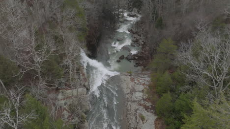 Aerial-drone-shot-of-creek-and-waterfall-at-Chattanooga,-TN