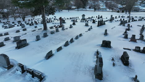 Graveyard-cemetery-tombstones-in-winter-snow
