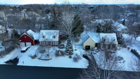 Truck-shot-of-Cape-Cod-homes-covered-in-winter-snow