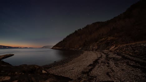 Beautiful-Scenery-In-A-Beach-From-Morning-Till-Night-With-Spectacular-View-Of-The-Northern-Lights---timelapse-shot