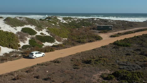 Vehicle-Driving-On-The-Trail-Towards-Sea-In-West-Coast-National-Park,-South-Africa-At-Winter