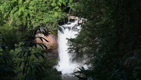 cascading-waterfalls-zoomed-out,-Heo-Suwat-Waterfall,-Khao-Yai-National-Park,-Thailand