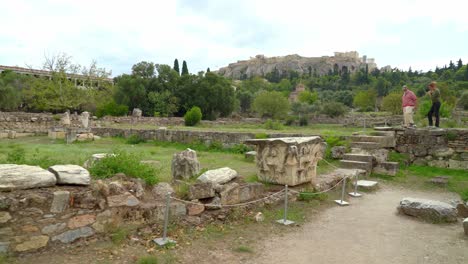 Ruins-of-Ancient-Agora-of-Athens-with-Acropolis-in-Background-on-Moody-Day