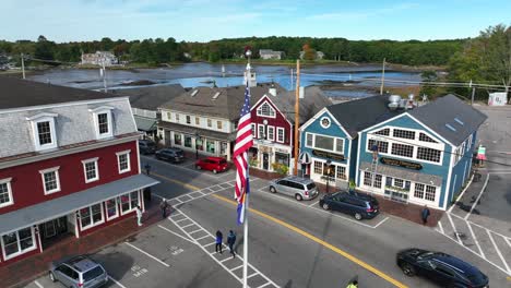 Aerial-orbit-of-USA-and-Maine-flags-reveals-small-village-of-Kennebunkport