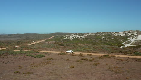 Car-Traveling-Through-Nature-Landscape-In-West-Coast-National-Park,-South-Africa