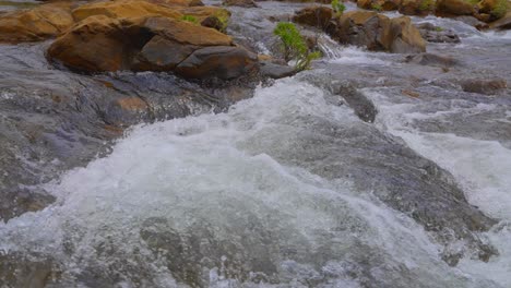 Close-up-shot-of-a-river-in-slow-motion-during-the-day