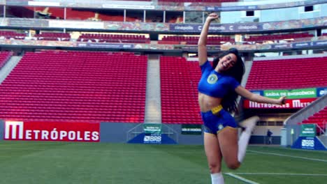 Cute-Brazilian-football-fan-jumps-and-celebrates-in-stadium