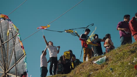 People-With-Their-Kites-During-Dia-de-los-Muertos-In-Sumpango,-Guatemala---wide
