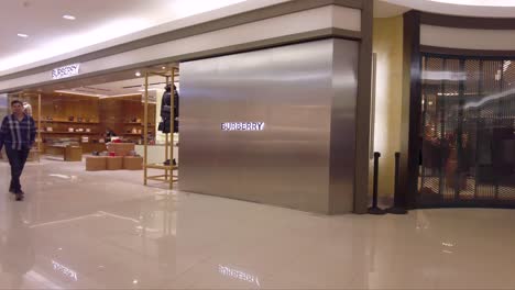 Panning-shot-inside-a-retail-store-with-burberry-and-hermes-boutiques-it-in-Mexico