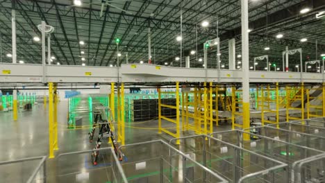 Flying-Over-The-Storage-Racks-Of-Parcels-And-Conveyor-Belt-System-Inside-The-Amazon-Fulfillment-Center-In-Fort-Myers,-Florida