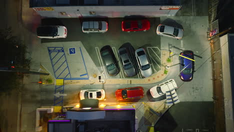 Drive-Through-Fast-Food-Line,-Drone-Shot-of-Cars-in-Formation-Heading-To-Restaurant-Window-Pickup