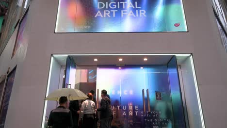 Chinese-visitors-and-art-enthusiasts-arrive-at-the-Digital-Art-Fair-Asia-showcasing-upcoming-trends-such-as-Web-3
