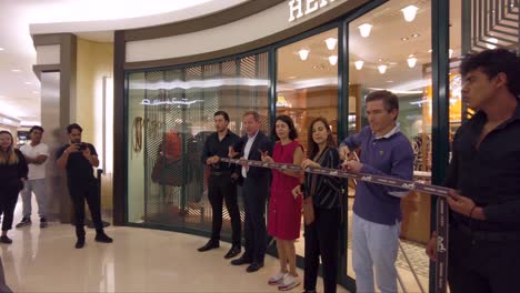 Staff-of-the-Hermes-store-preparing-rehearsing-for-the-opening-inauguration-of-a-new-store-inside-a-big-retailer