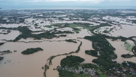 A-typhoon-caused-flooding-and-damaged-farms-and-homes-due-to-heavy-rain,-setting-a-calamity-in-the-area