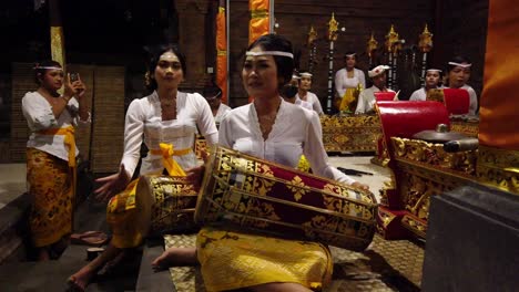 Balinese-Music,-Group-of-Girls-Playing-Gamelan,-Temple-in-Bali-Indonesia,-Asian-Hinduism,-Religious-Ceremony,-Beautiful-Traditional-Costumes