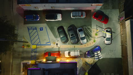 Fast-Food-Lineup,-Aerial-Drone-Shot-of-Cars-in-Line-at-Drive-Through-Fast-Food-Restaurant-in-Evening