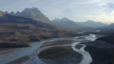 Flyover-above-river-valley-in-Rocky-Mountain-range,-Nordegg,-Alberta-Canada