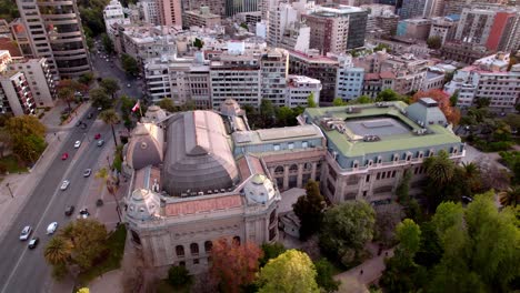 Pan-Above-Museum-of-Fine-Arts-Santiago,-Chile-Latin-American-Architecture,-Drone-Flying-the-Capital-City-near-Parque-Forestal-during-daily-light-business-hours